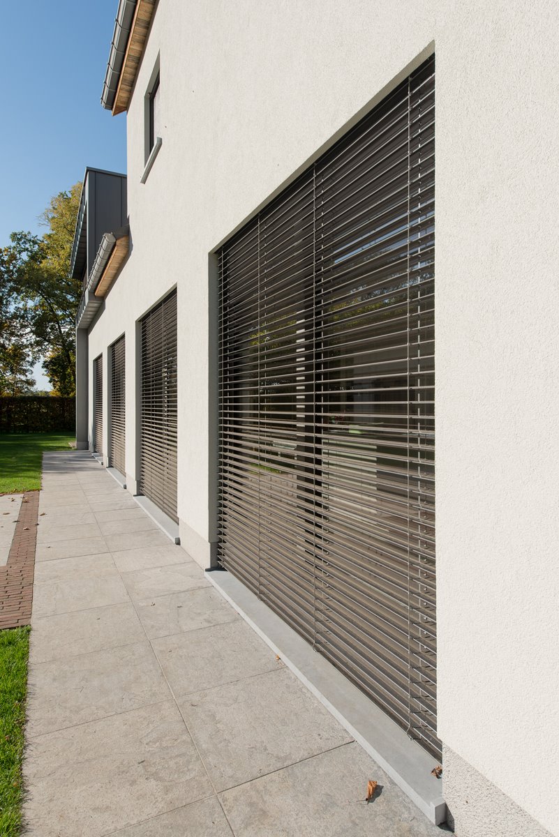 Zonwering en aluminium buitenschrijnwerk ramen deuren woning Hechtel-Eksel Schüco Corswarem