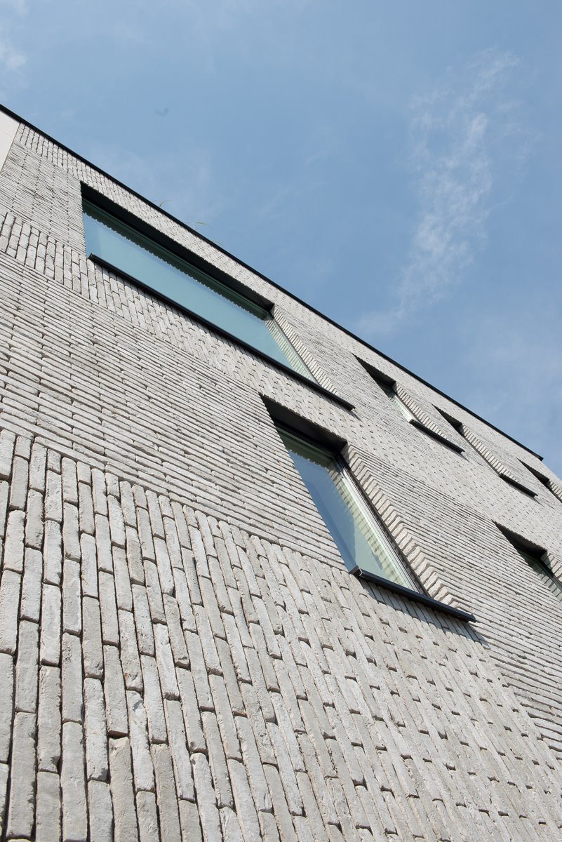 Aluminium buitenschrijnwerk ramen deuren woning Hasselt Schüco Corswarem