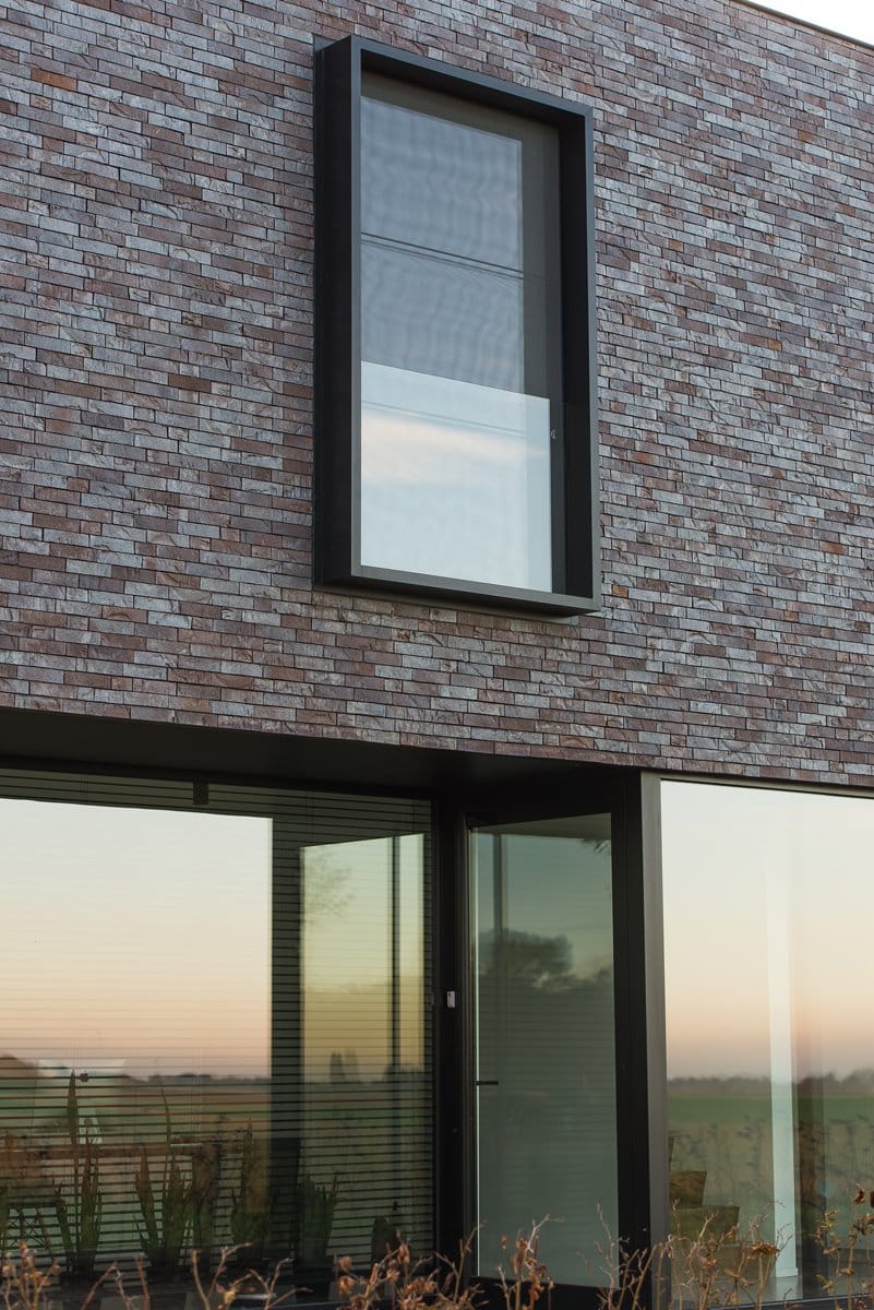 Aluminium buitenschrijnwerk ramen deuren woning Lafelt Schüco Corswarem