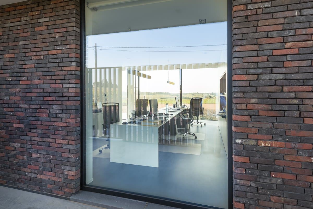 Aluminium buitenschrijnwerk ramen deuren woning Zichem Schüco Corswarem