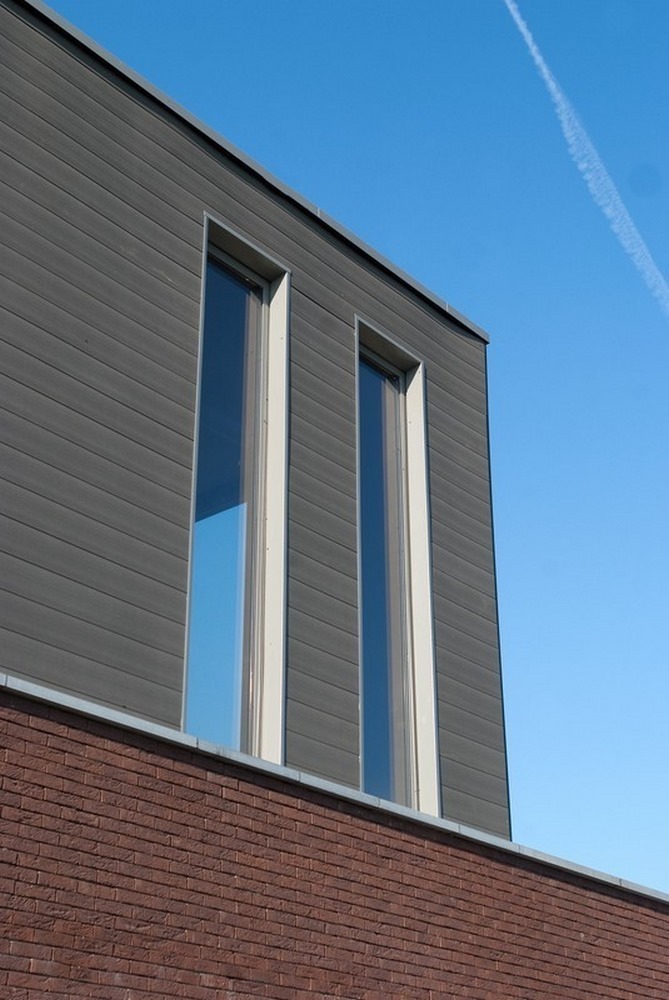 Aluminium buitenschrijnwerk ramen deuren woning Bekkevoort Schüco Corswarem