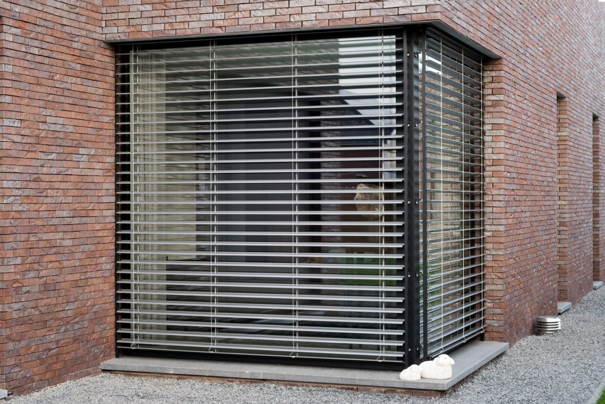 Aluminium buitenschrijnwerk ramen deuren zonwering Maasmechelen Schüco Corswarem