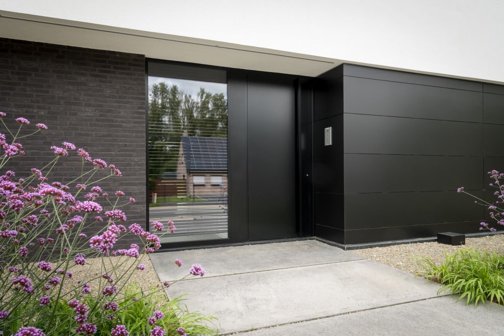 Aluminium buitenschrijnwerk ramen deuren woning Herk-de-Stad Schüco Corswarem