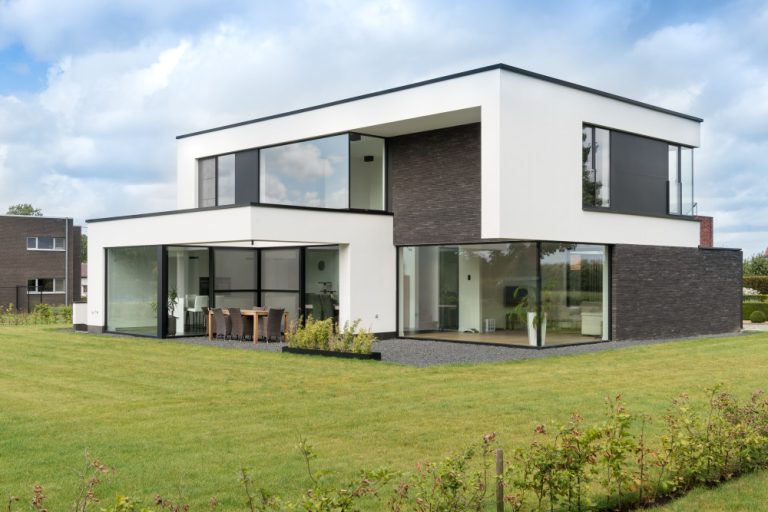 Gevelbekleding en aluminium buitenschrijnwerk ramen deuren woning Sint-Truiden Schüco Corswarem