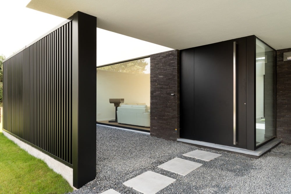 Gevelbekleding en aluminium buitenschrijnwerk ramen deuren woning Sint-Truiden Schüco Corswarem