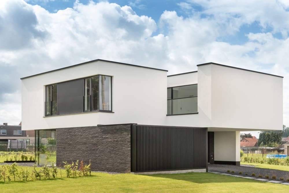 Gevelbekleding en aluminium buitenschrijnwerk ramen deuren woning Sint-Truiden Schüco Corswarem
