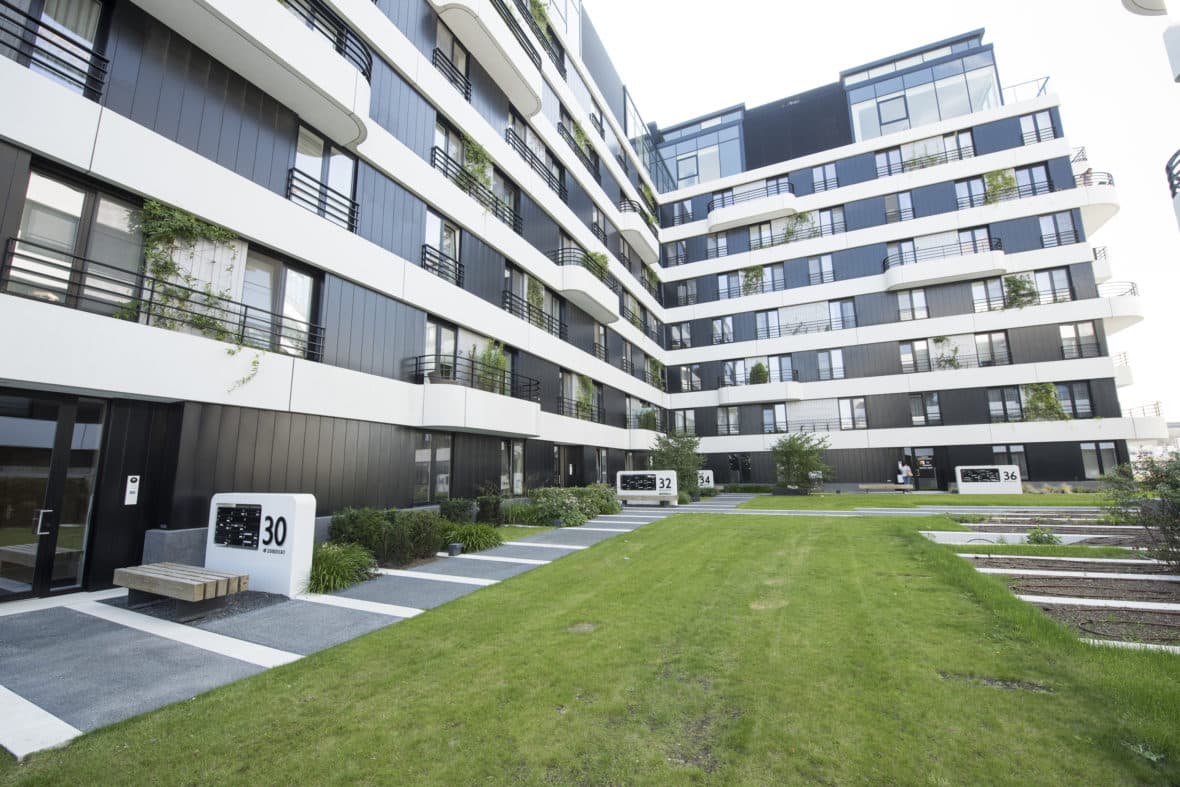 Aluminium buitenschrijnwerk ramen deuren glasgevel gevelbekleding Zuidzicht Hasselt projectbouw Schüco Corswarem