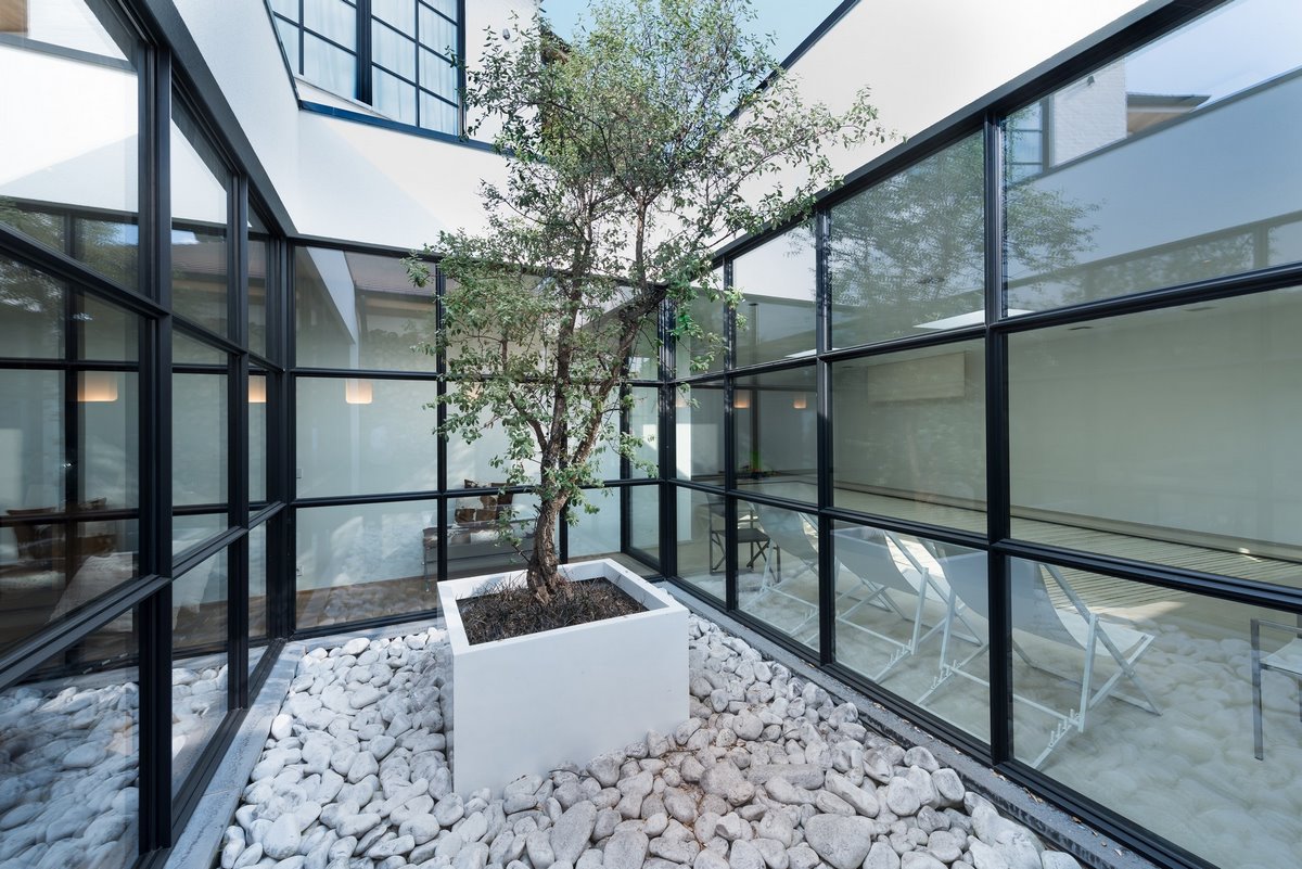 Aluminium buitenschrijnwerk ramen deuren woning Sint-Truiden Schüco Corswarem