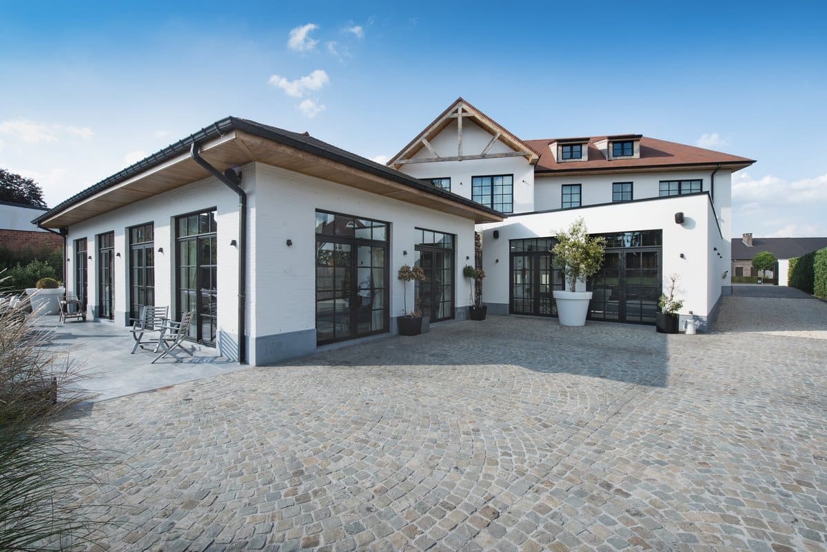 Aluminium buitenschrijnwerk ramen deuren woning Sint-Truiden Schüco Corswarem