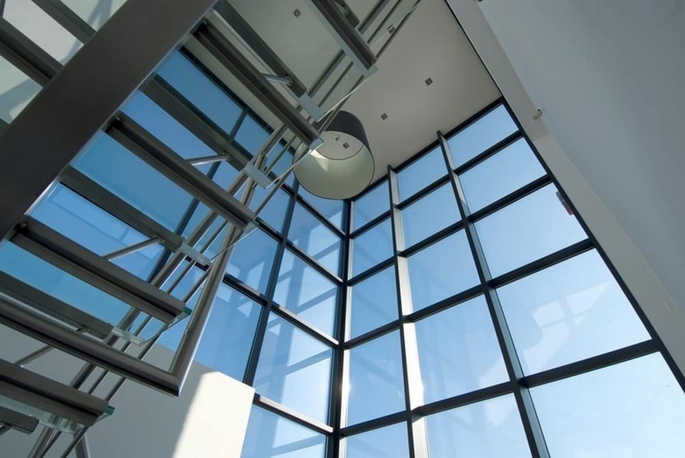 Aluminium buitenschrijnwerk ramen deuren woning Diepenbeek Schüco Corswarem