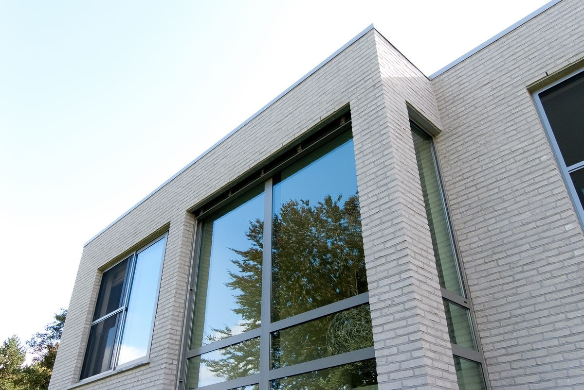 Zonwering en aluminium buitenschrijnwerk ramen deuren woning Grimbergen Schüco Corswarem