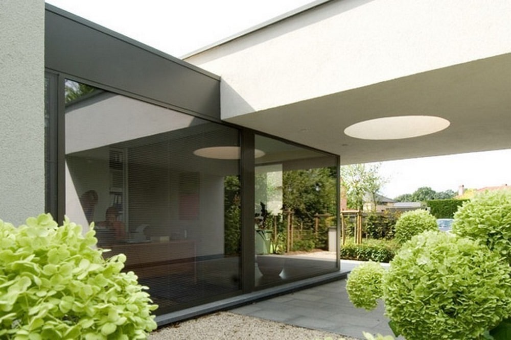 Aluminium buitenschrijnwerk ramen deuren woning Hasselt Schüco Corswarem