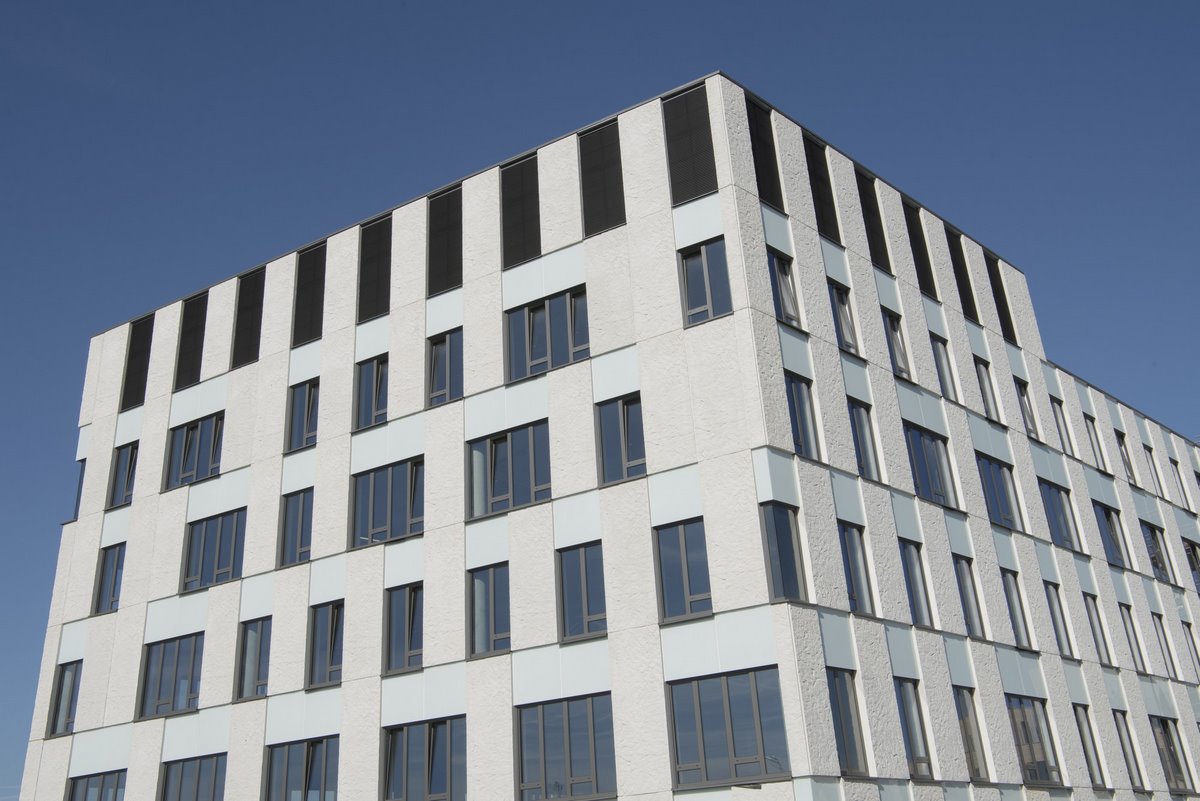 Aluminium buitenschrijnwerk ramen deuren glasgevel gevelbekleding UZ Leuven projectbouw Schüco Corswarem
