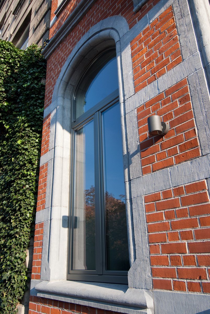 Aluminium buitenschrijnwerk ramen deuren woning Leuven Schüco Corswarem