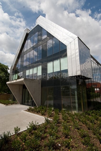 Aluminium buitenschrijnwerk ramen deuren glasgevel gevelbekleding Singelbeek Hasselt projectbouw Schüco Corswarem