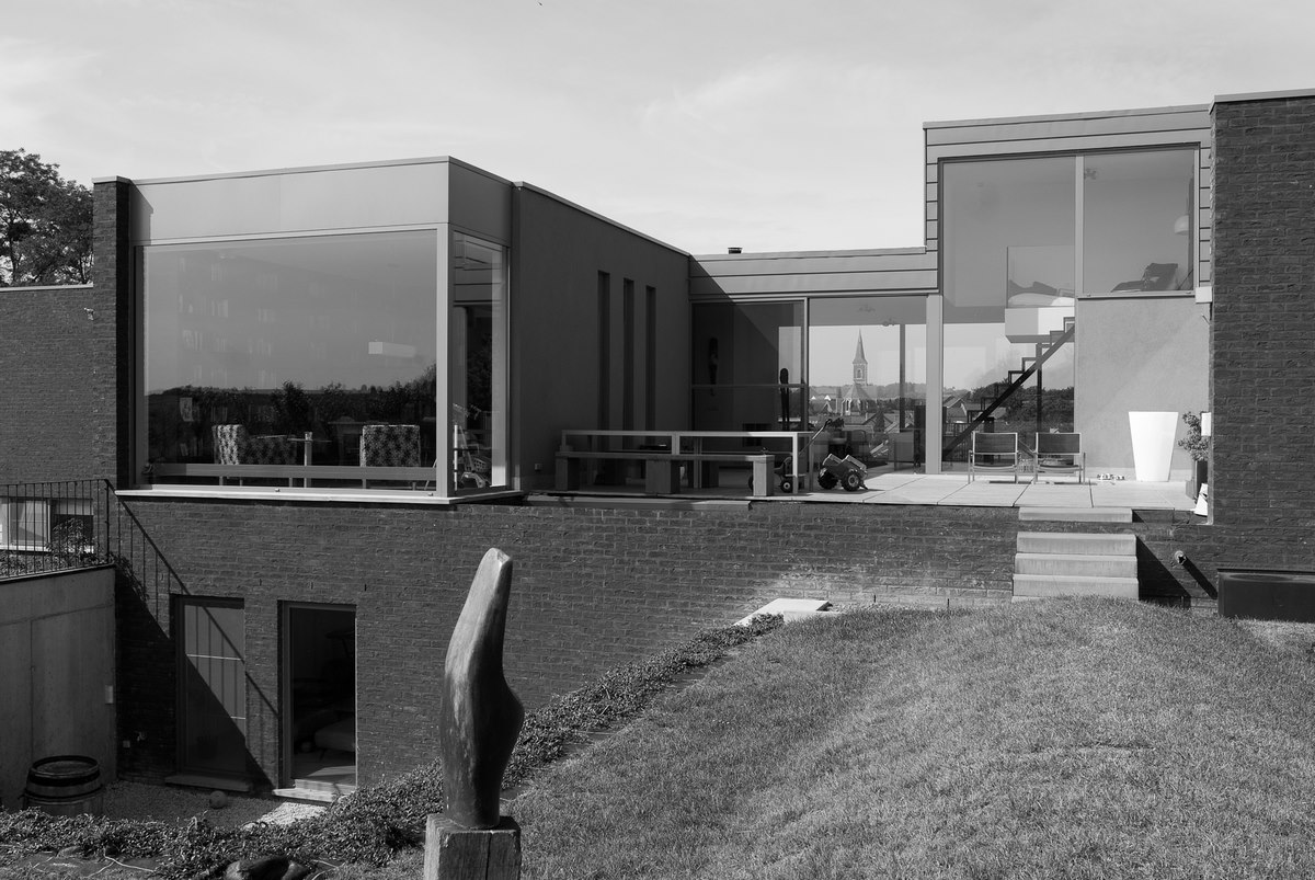 Aluminium buitenschrijnwerk ramen deuren woning Genoelselderen Schüco Corswarem