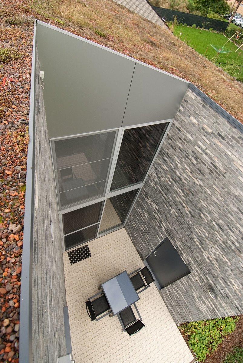 Vliegenwering en aluminium buitenschrijnwerk ramen deuren woning Lummen Schüco Corswarem