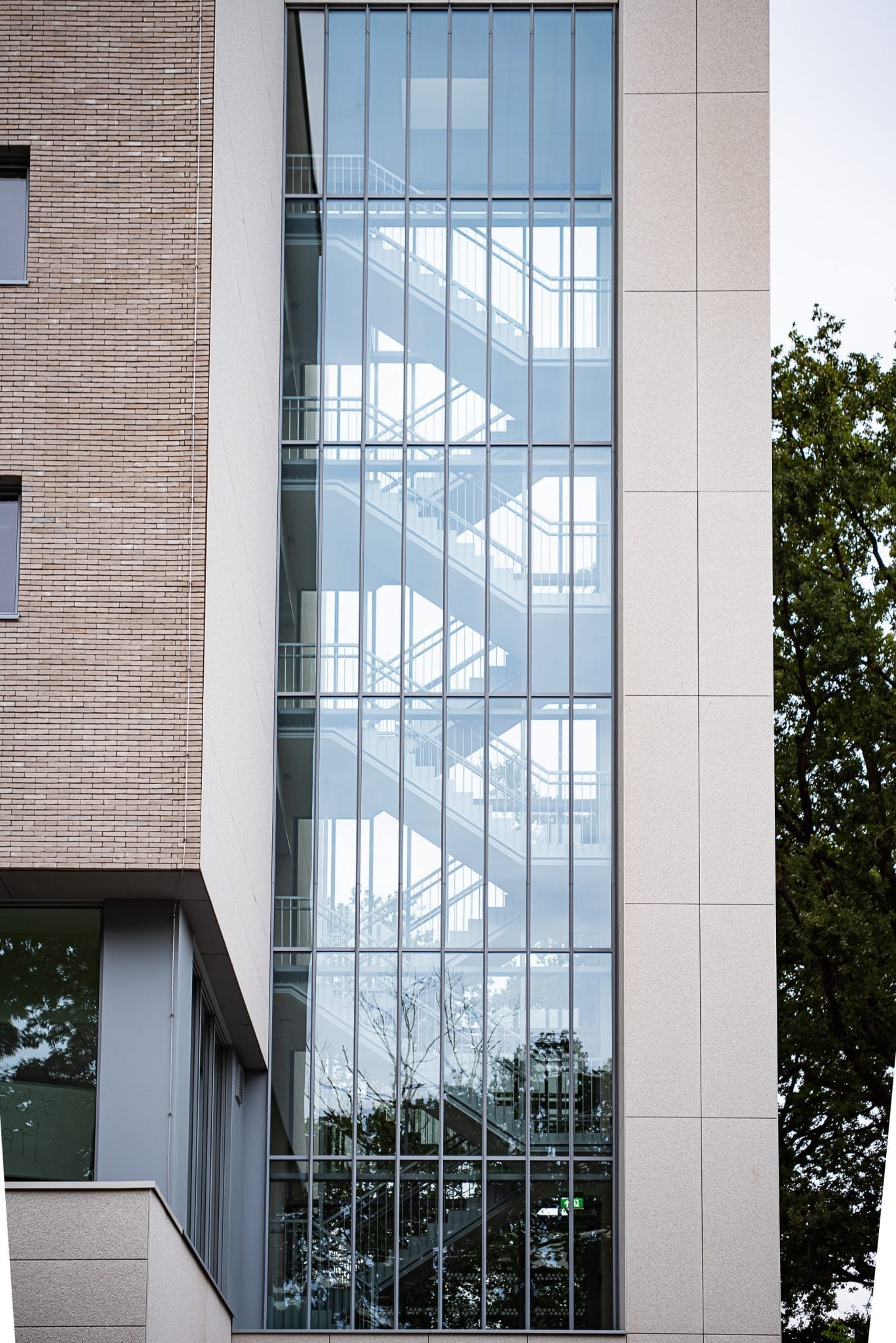 Aluminium buitenschrijnwerk ramen deuren glasgevel gevelbekleding Heiderust Genk projectbouw Schüco Corswarem